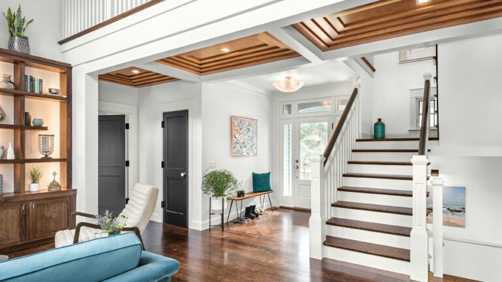 Hardwood flooring installed in the entryway of a house