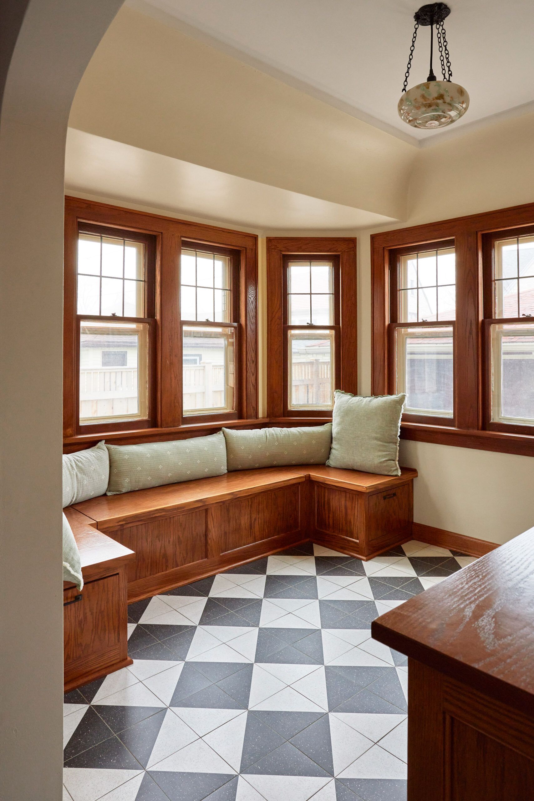 Sun room off kitchen with built in bench